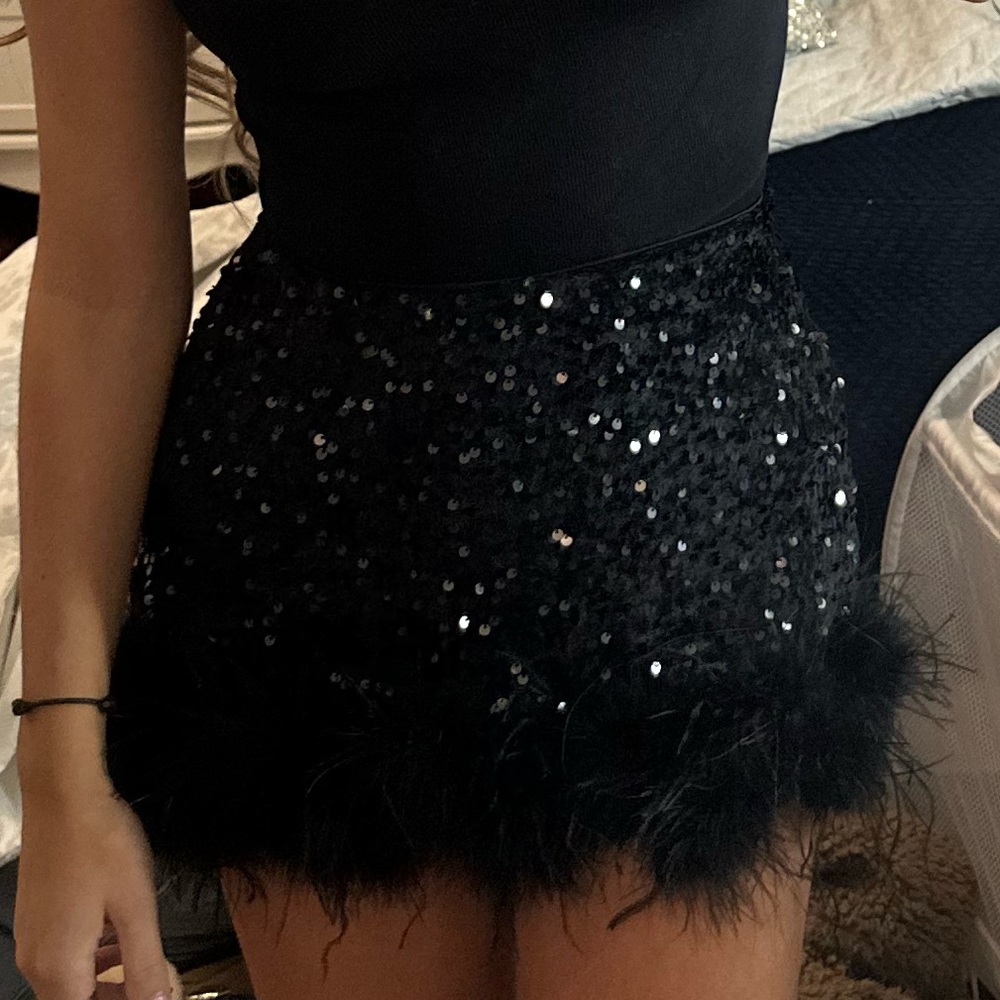 Black Sequin skirt feather trim